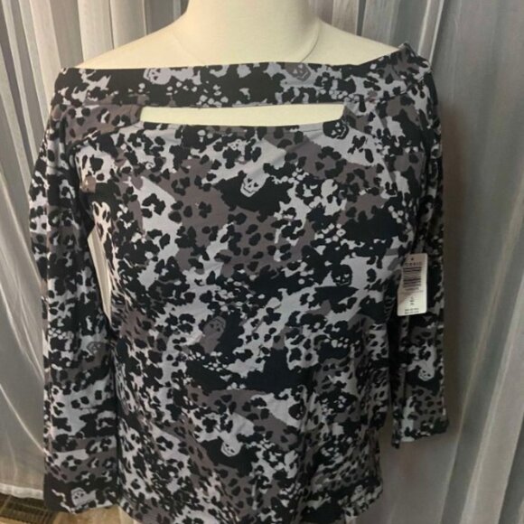 Torrid size 4LoveSick Cold Shoulder Keyhole Tee - Super Soft Black Hiding Skulls - Picture 6 of 10